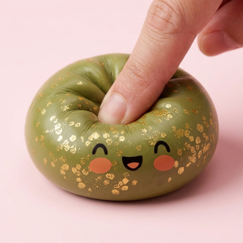 Dumpling Squishy Glitter Smaragdgroen tijdens het knijpen, zacht materiaal