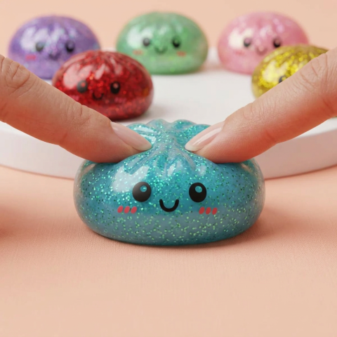 Glitter Dumpling Squishy Set van 6 tijdens het knijpen, zacht materiaal