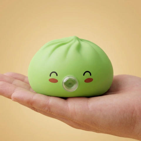 Dumpling Squishy Matcha Rare Blow Groen in de hand gehouden, echte grootte
