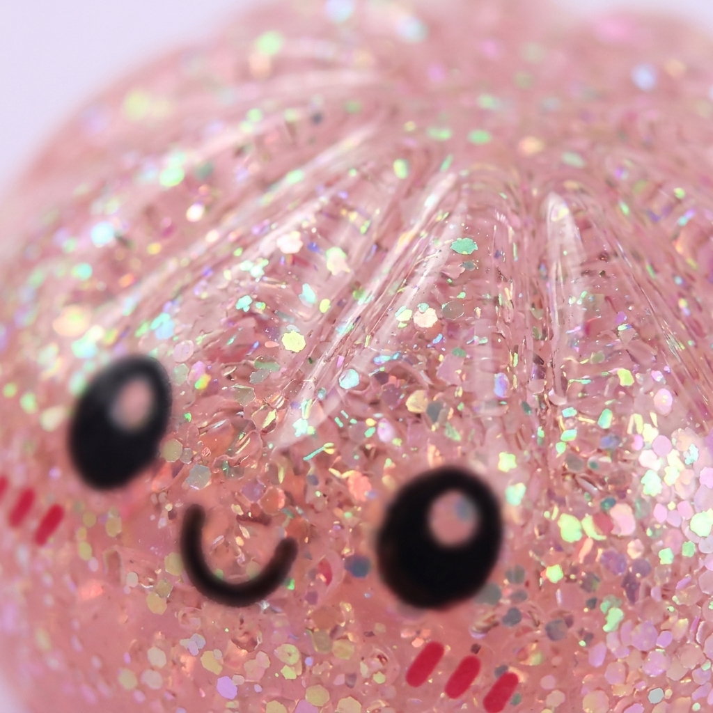 Dumplings Squishy Glitter Mystery – Glinsterende Verrassing — macro-close-up van de textuur