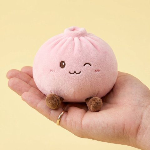 Squishy Dumpling Toy Roze XXL Knuffelkussen in de hand gehouden, echte grootte