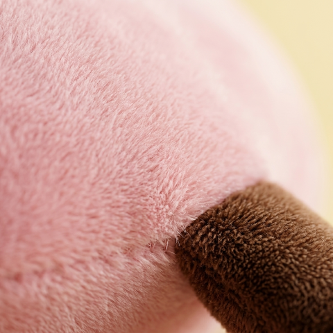 Squishy Dumpling Toy Roze XXL Knuffelkussen — macro-close-up van de textuur