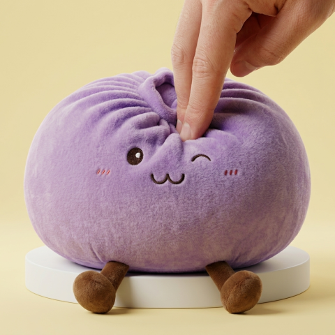 Dumpling Squishy Giant Paars tijdens het knijpen, zacht materiaal