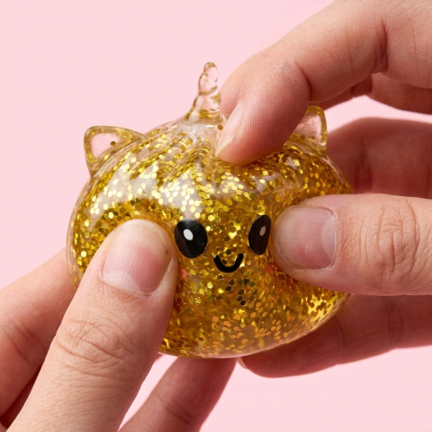 Glitter Dumpling Squishy Eenhoorn Goud — slow-rise effect, het schuim vert langzaam terug