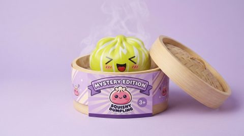 Squishy Dumpling Mystery Happy Faces in het bamboe stoommandje